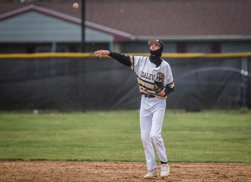 Daleville's Meryck Adams throws a ball across the diamond during a game against Cowan at Daleville High School Thursday, April 7, 2022.