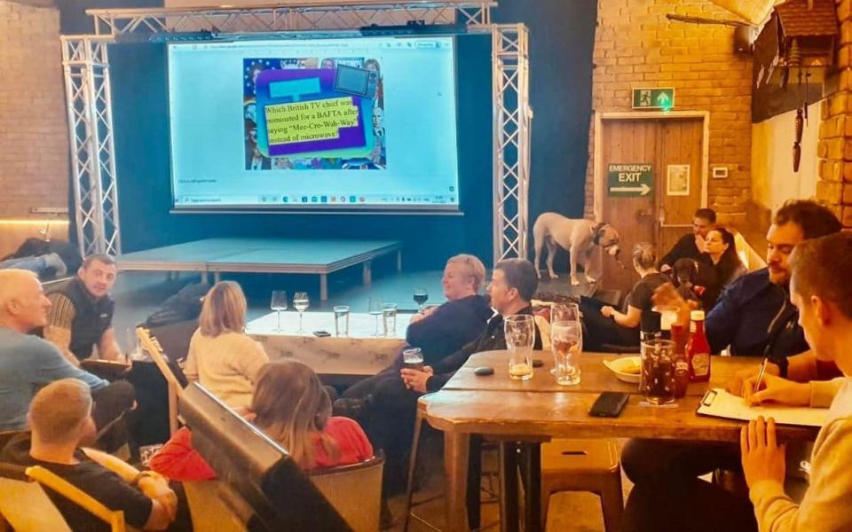 Stranded guests take part in a quiz at the Tan Hill Inn, in the Yorkshire Dales on 28 November 2021 - PA/PA