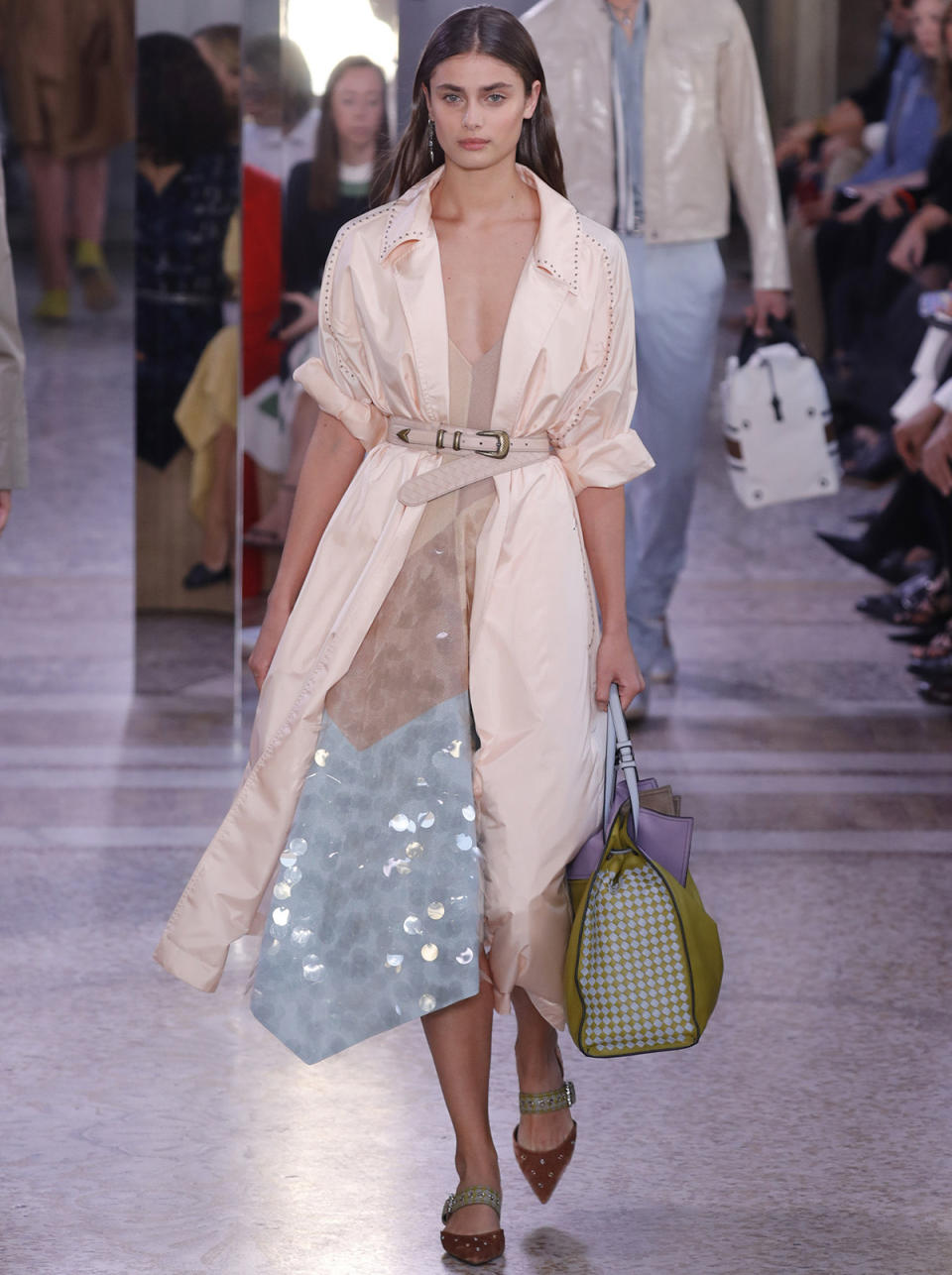 <p>Taylor makes a case for the belt in this chic, layered ensemble at Bottega Veneta. </p>