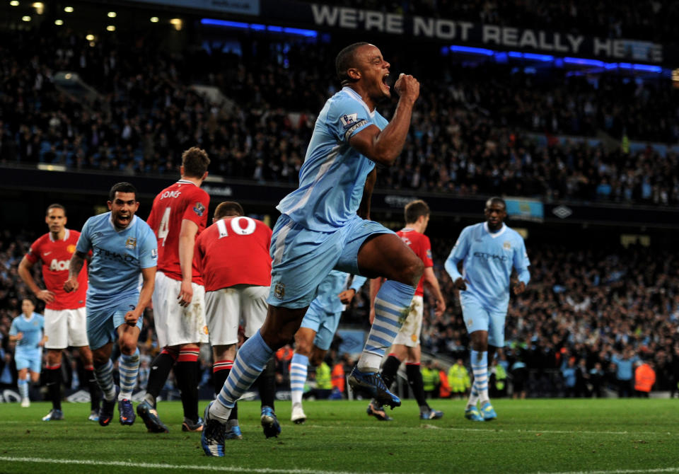 MANCHESTER, ENGLAND - APRIL 30: Vincent Kompany of Manchester City celebrates scoring the opening goal during the Barclays Premier League match between Manchester City and Manchester United at the Etihad Stadium on April 30, 2012 in Manchester, England. (Photo by Michael Regan/Getty Images)