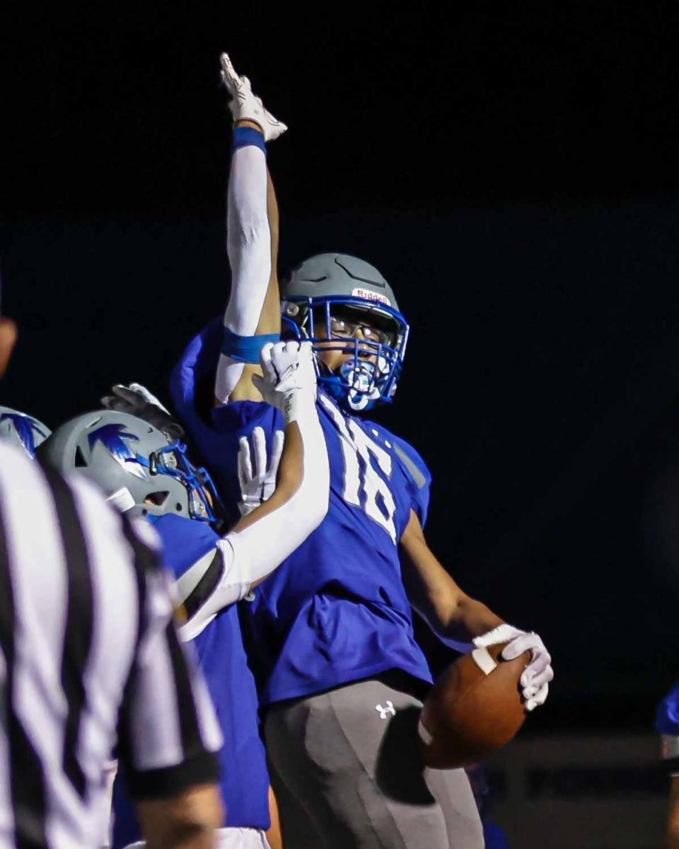 Malachi Victor (16) celebrates after scoring a defensive TD. The Cedar Crest Falcons played host to the Penn Manor Comets on Friday, Sept. 15, 2023. The Falcons defeated the Comets, 42-13, to improve to 4-0.