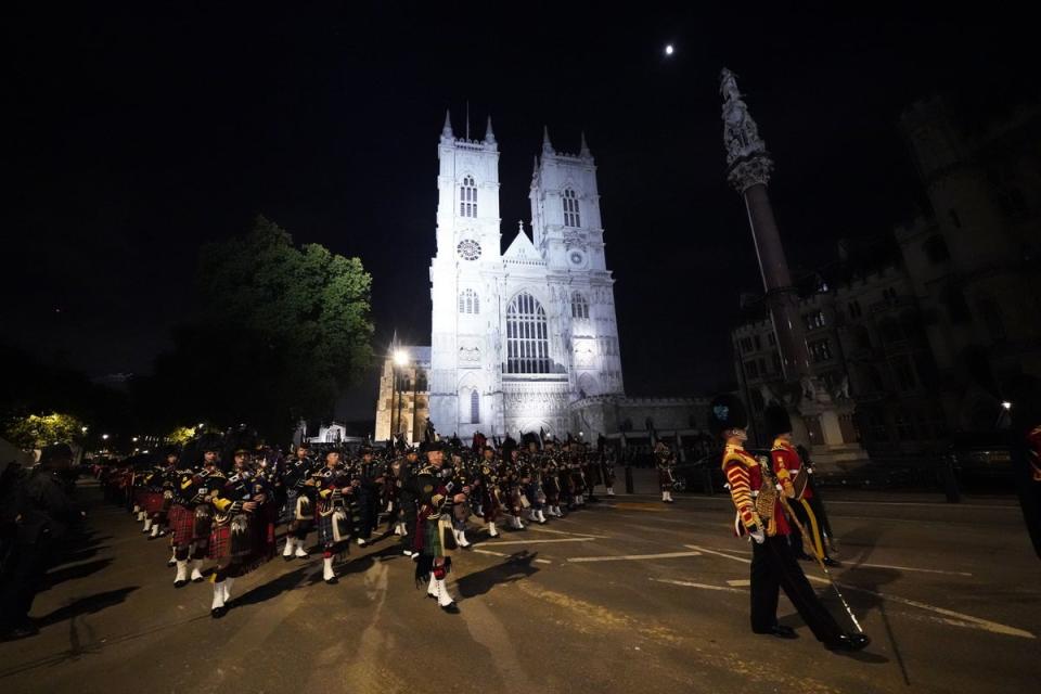 A funeral procession marches through Parliament Square during a rehearsal (PA)