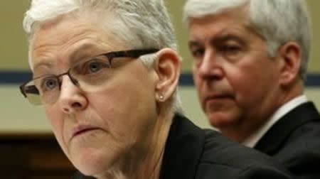 Michigan Governor Rick Snyder (R) and EPA Administrator Gina McCarthy (L) testify before a House Oversight and government Reform hearing on "Examining Federal Administration of the Safe Drinking Water Act in Flint, Michigan, Part III" on Capitol Hill in Washington March 17, 2016. REUTERS/Kevin Lamarque