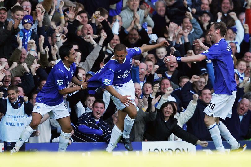 James Vaughan celebrates his goal with Tim Cahill and Duncan Ferguson in the match between Everton and Crystal Palace at Goodison Park on April 10, 2005