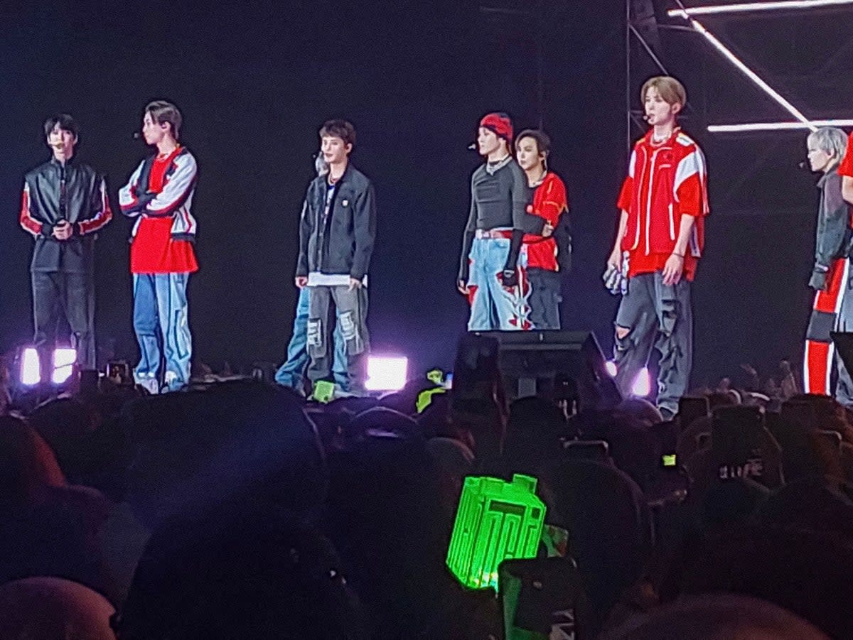 Members of K-pop music band NCT127 performing in Serpong, Banten province, before the concert was stopped after chaos broke out and 30 people fainted in a crush on 4 Noveber 2022  (AFP via Getty Images)