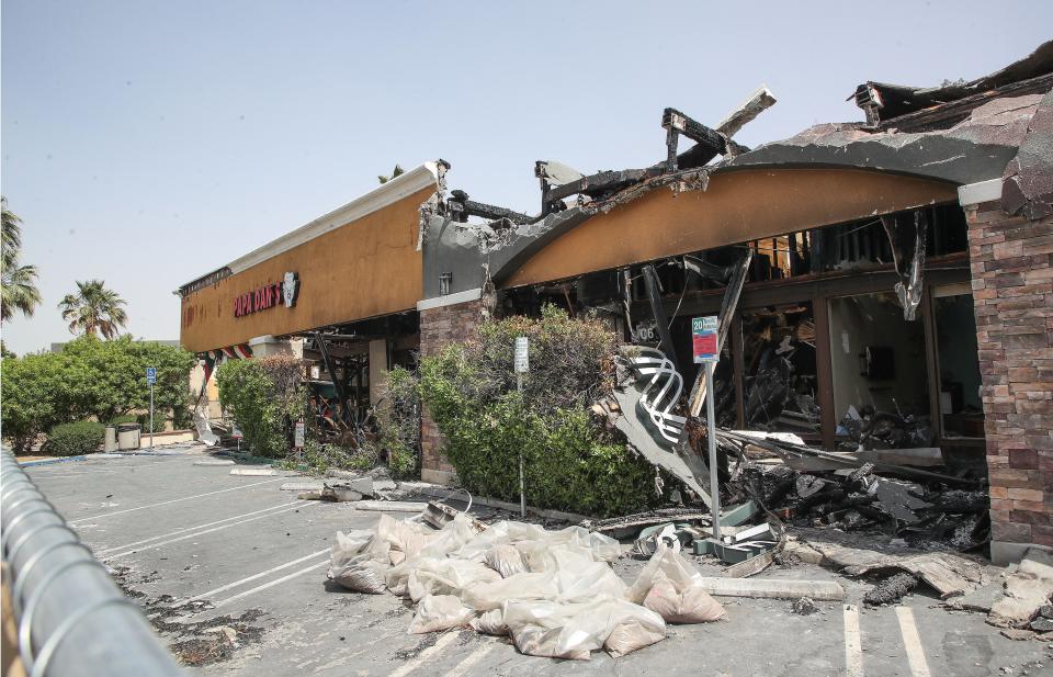 This building that was destroyed in the Plaza De Monterey Shopping Center, seen April 15.