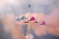 Frecce Tricolori (Tricolor Arrows), the Italian Air Force aerobatic display team, perform during the opening day of the Dubai Air Show, United Arab Emirates, Monday, Nov. 13, 2023. (AP Photo/Kamran Jebreili)