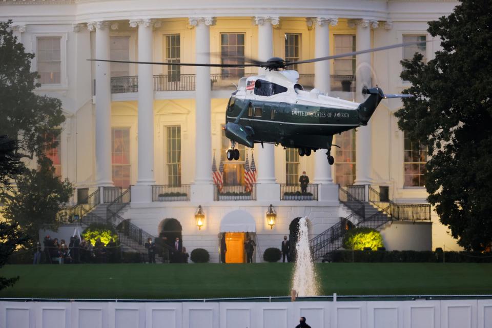 The president arrives at the White House on board Marine One following his discharge from hospital (REUTERS)