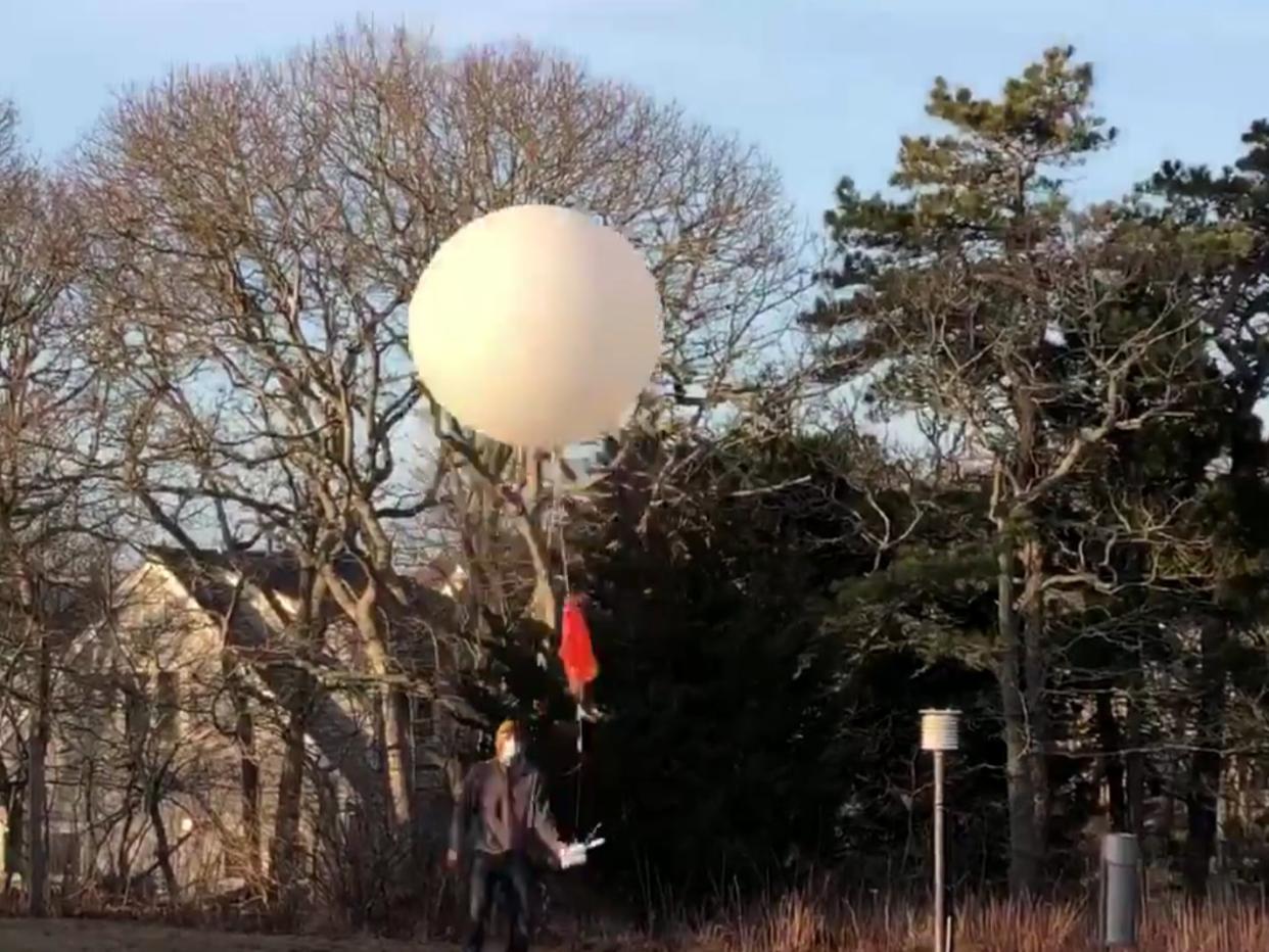 <p>Officials at the Chatham, Massachusetts, weather station on its final day </p> (US National Weather Service)