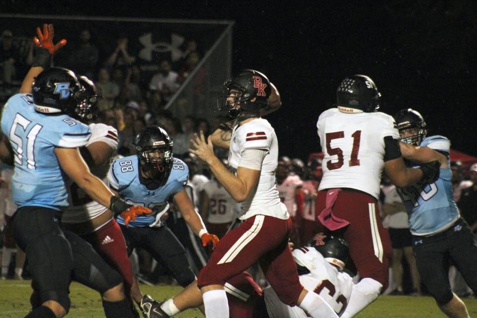Bishop Kenny quarterback James Resar (9) throws a pass under pressure from Ponte Vedra's Ryker Kemp (51) during a high school football game on October 6, 2023. [Clayton Freeman/Florida Times-Union]