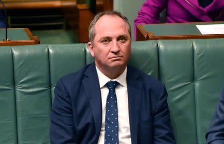 FILE PHOTO: Australian Deputy Prime Minister Barnaby Joyce sits in the House of Representatives at Parliament House in Canberra, Australia, August 14, 2017. AAP/Mick Tsikas/via REUTERS.