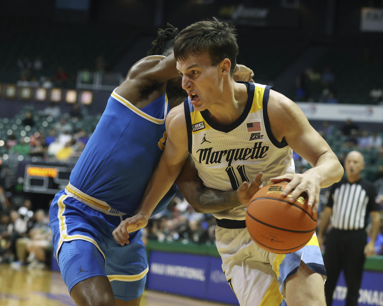 Tyler Kolek and No. 4 Marquette will face No. 1 Kansas Tuesday night. (AP Photo/Marco Garcia)