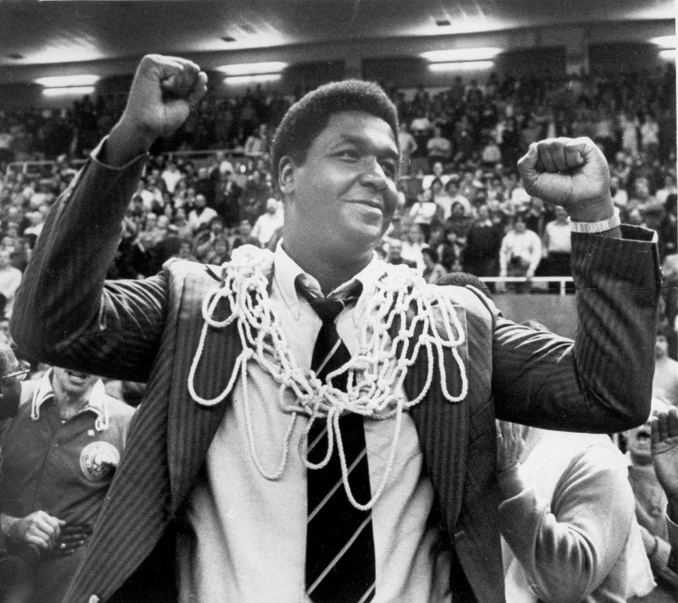 Georgetown coach John Thompson celebrates with the net around his neck after the Hoyas defeated Syracuse, 87-81, to win the Big East championship on March 1, 1980, at the Providence Civic Center.