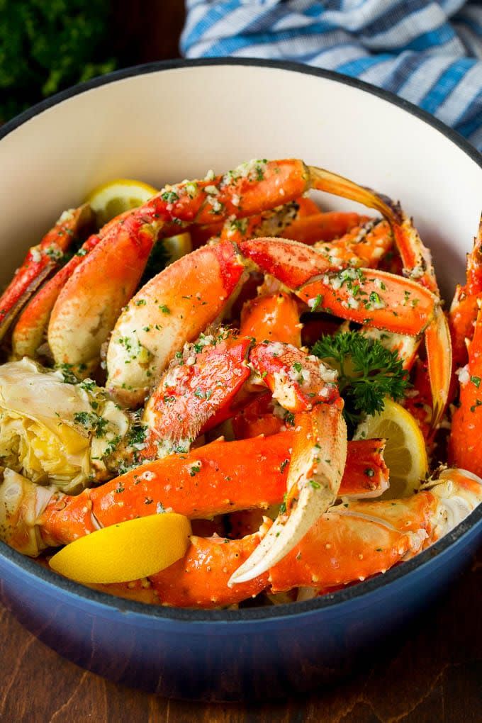 <p>Steamed and coated in a tasty garlic butter sauce, yum! It's a super simple and incredibly satisfying way of enjoying the meaty shellfish. </p><p>Get the <a href="https://www.dinneratthezoo.com/crab-legs/" rel="nofollow noopener" target="_blank" data-ylk="slk:Crab Legs with Garlic Butter;elm:context_link;itc:0;sec:content-canvas" class="link ">Crab Legs with Garlic Butter</a> recipe.</p><p>Recipe from <a href="https://www.dinneratthezoo.com/" rel="nofollow noopener" target="_blank" data-ylk="slk:Dinner At The Zoo;elm:context_link;itc:0;sec:content-canvas" class="link ">Dinner At The Zoo</a>.</p>