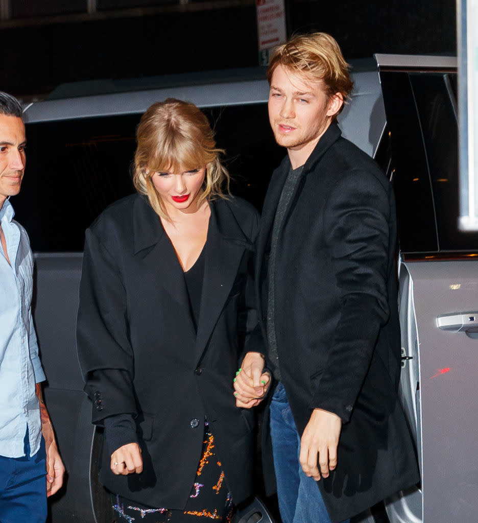 Taylor Swift and Joe Alwyn exiting a vehicle