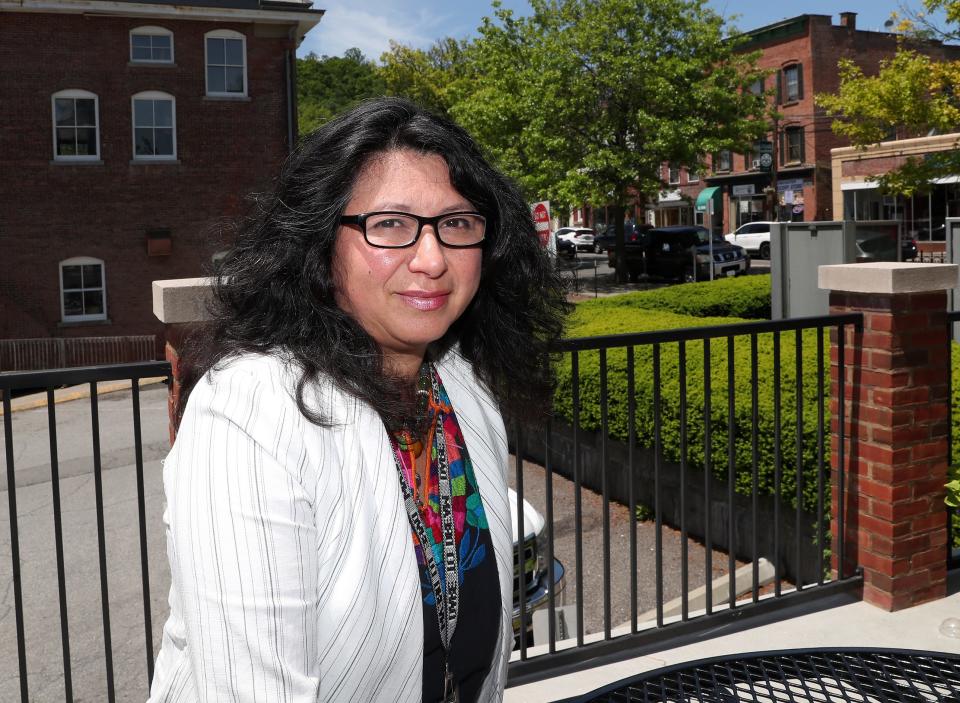 Norma Pereira worries about the future of the village of Brewster with the revitalization plans that include demolishing businesses and apartments on Main Street in the village of Brewster May 23, 2022. 