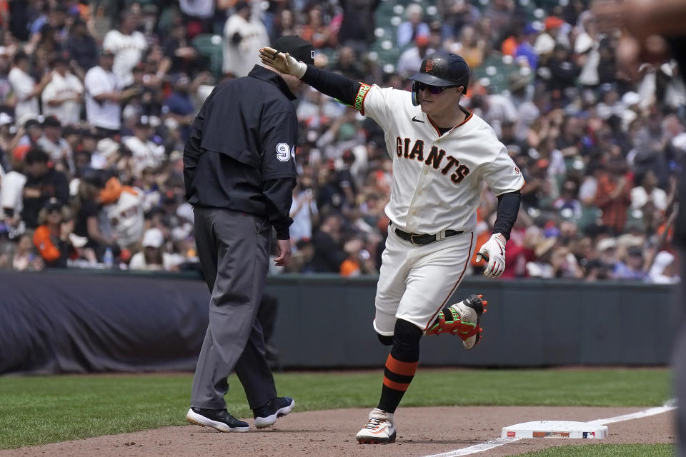 San Francisco Giants' Joc Pederson celebrates after hitting a two-run home run against the Chicago Cubs during the third inning of a baseball game in San Francisco, Sunday, June 11, 2023. (AP Photo/Jeff Chiu)