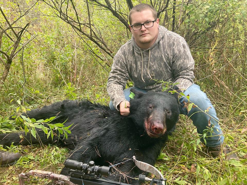 Buck Strunk with his black bear he shot Oct. 23 with a crossbow in eastern Pennsylvania.
