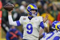 Los Angeles Rams' Matthew Stafford thorws during the first half of an NFL football game against the Green Bay Packers Sunday, Nov. 28, 2021, in Green Bay, Wis. (AP Photo/Matt Ludtke)