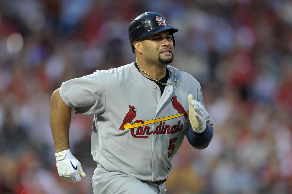 PHILADELPHIA, PA - OCTOBER 01: Albert Pujols #5 of the St. Louis Cardinals runs to first on a ground out in the sixth inning of Game One of the National League Division Series against the Philadelphia Phillies at Citizens Bank Park on October 1, 2011 in Philadelphia, Pennsylvania. (Photo by Drew Hallowell/Getty Images)