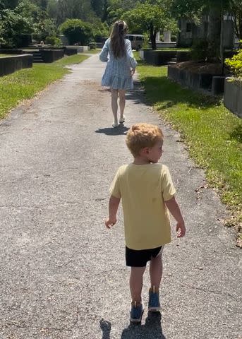 <p>Courtesy of Haley Hodge</p> Haley Hodge looks for baby names in a North Carolina cemetery with her family