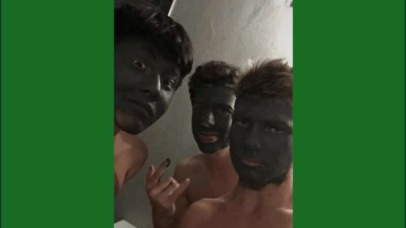 Three boys wearing acne masks