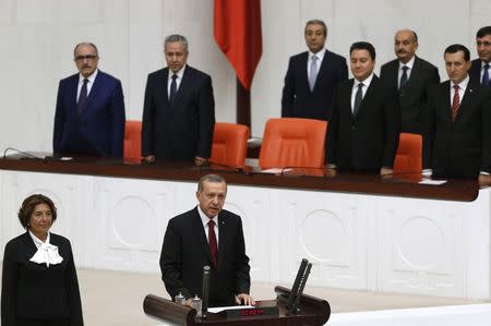 Turkey's new President Tayyip Erdogan (front C) attends a swearing in ceremony at the parliament in Ankara August 28, 2014. REUTERS/Umit Bektas