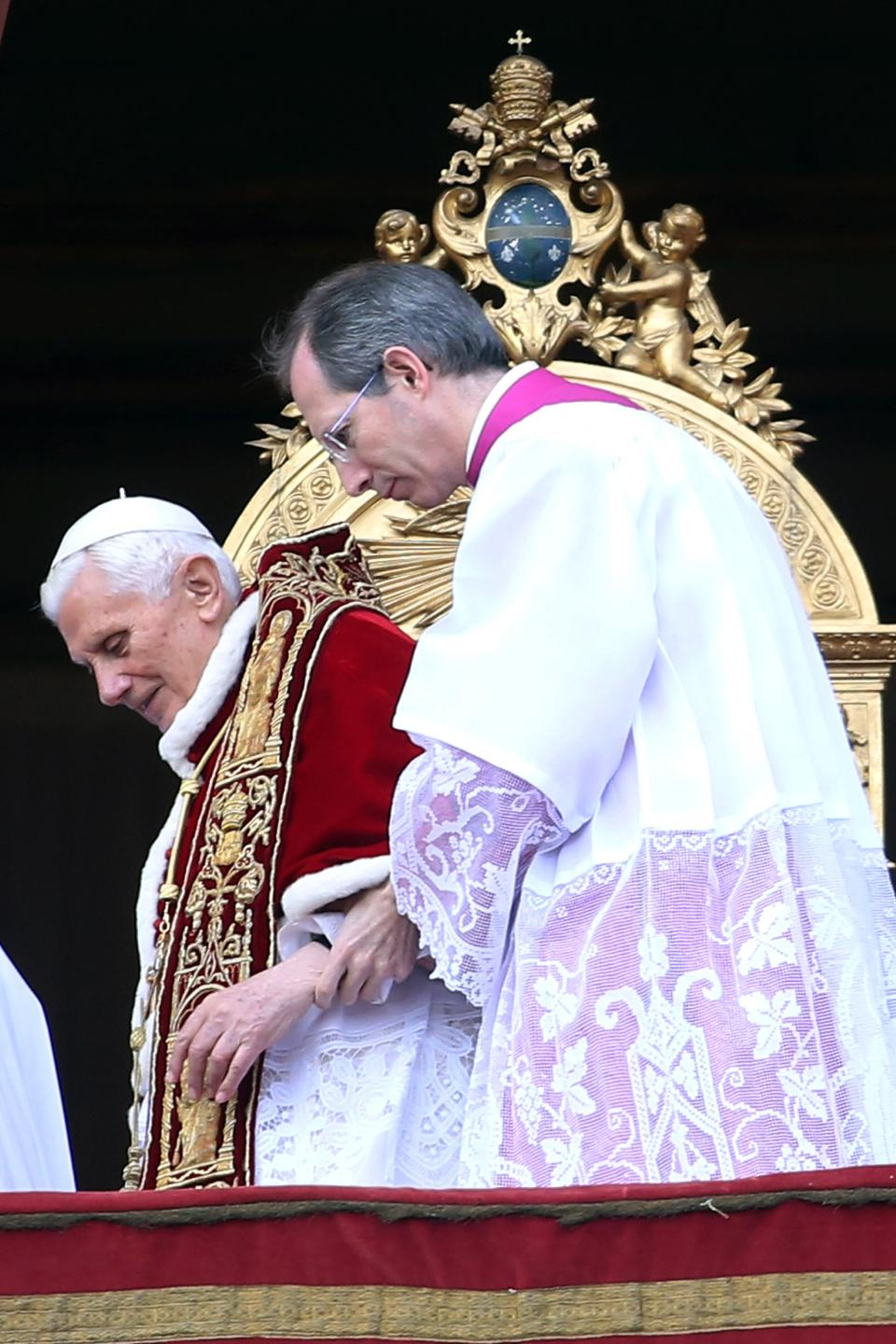 VATICAN CITY, VATICAN - DECEMBER 25: Pope Benedict XVI delivers his Christmas Day message from the central balcony of St Peter's Basilica on December 25, 2012 in Vatican City, Vatican. The 'Urbi et Orbi' (to the city and to the world) is recognised as a Christmas tradition by Catholics with the Pope focusing this year on the conflict in Syria, calling for a political solution. (Photo by Franco Origlia/Getty Images)