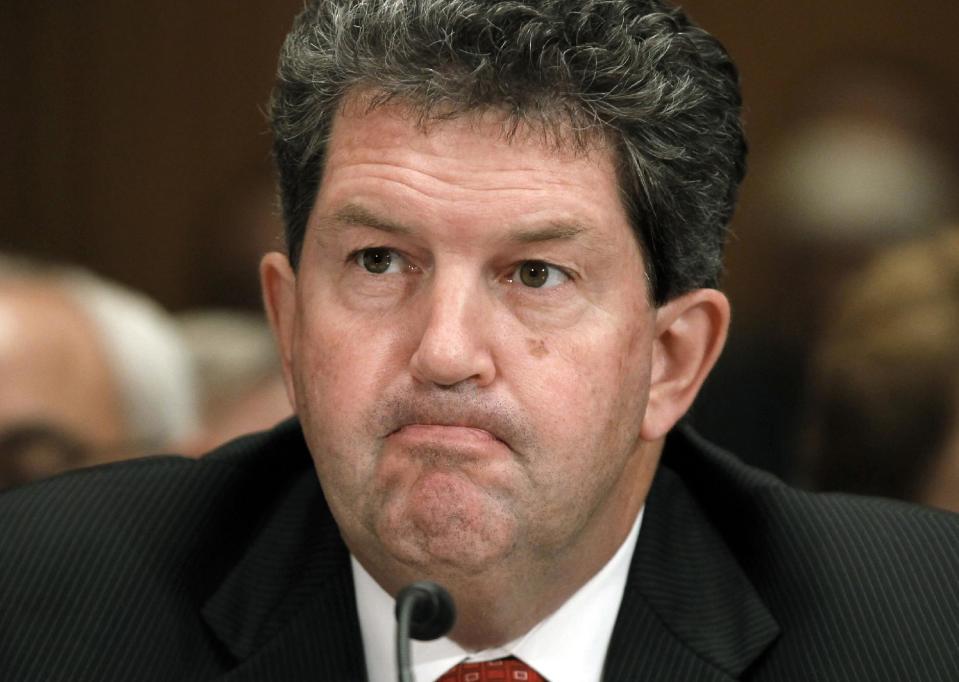 FILE - In this Sept. 6, 2011 file photo Postmaster General Patrick Donahoe testifies on Capitol Hill in Washington. The financially struggling U.S. Postal Service sought Wednesday to tamp down concern over wide-scale cuts, revealing it will seek to keep thousands of rural post offices open with shorter hours. (AP Photo/J. Scott Applewhite, File)