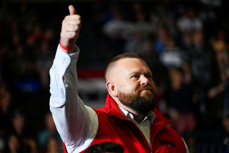 <div class="inline-image__caption"><p>US Congressional Republican candidate J.R. Majewski gives a thumbs-up at a rally by former U.S. president Donald Trump in Youngstown, Ohio, Sept. 17, 2022. </p></div> <div class="inline-image__credit">Gaelen Morse/Reuters</div>