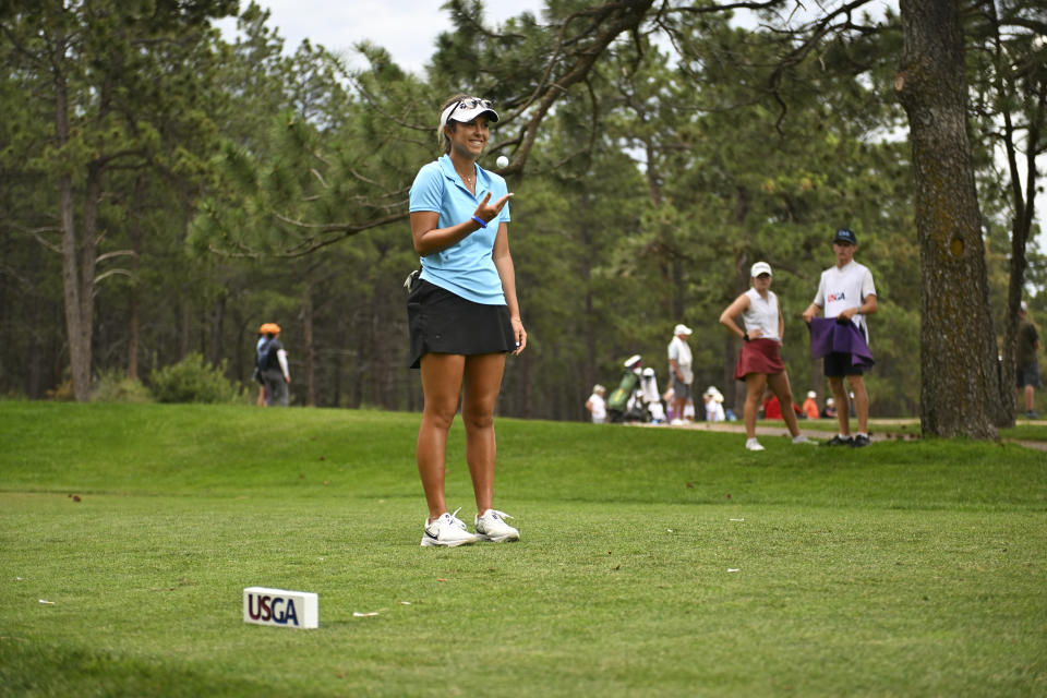 Yana Wilson plays with a golf ball while waiting to hit her drive off the hole 17 tee box during the second round of the 2023 U.S. Girls’ Junior at United States Air Force Academy Eisenhower Golf Club (Blue Course) in Colorado Springs, Colo. on Tuesday, July 18, 2023. (Kathryn Riley/USGA)