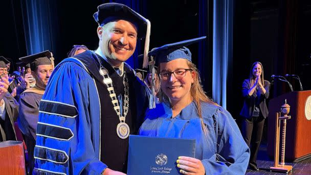 PHOTO: Kelsey Hudie walks across the stage during the May 2023 commencement ceremony at Henry Ford College in Dearborn, Michigan. (Rhonda DeLong/Henry Ford College)