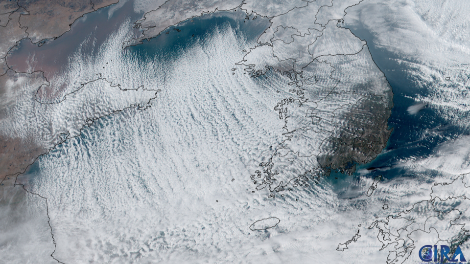 an image of earth taken by a satellite, showing white wispy clouds over blue oceans and green landmasses