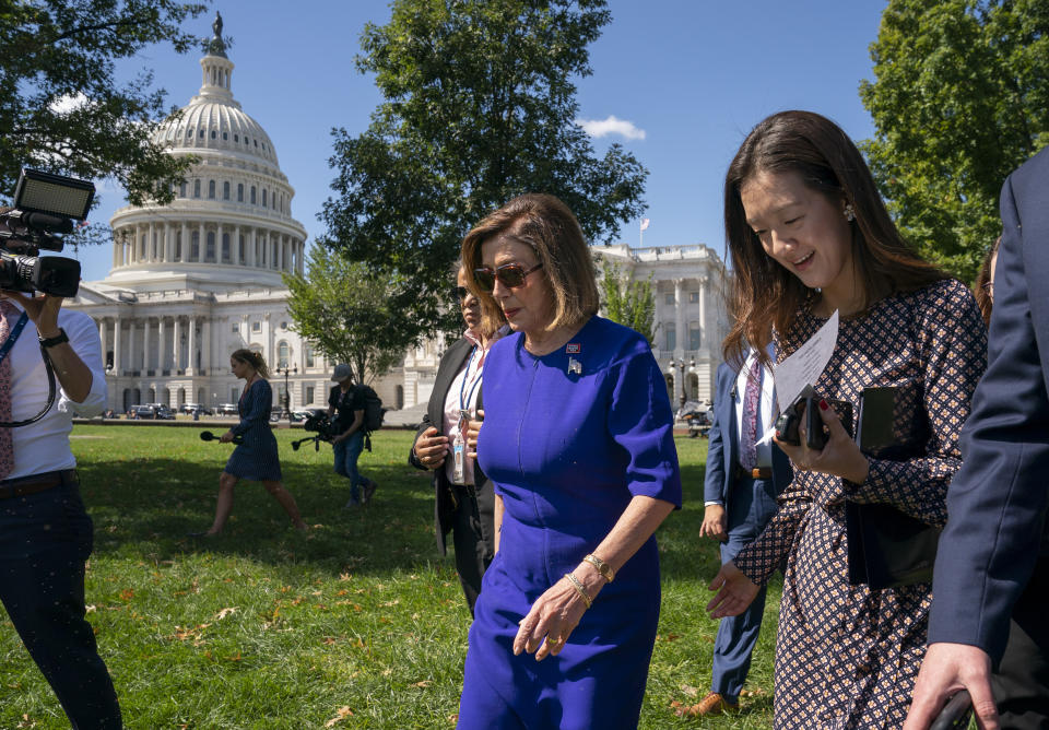 Speaker of the House Nancy Pelosi, D-Calif., joins a rally of organized labor to show support for union workers, at the Capitol in Washington, Tuesday, Sept. 24, 2019. More House Democrats are urging impeachment inquiry amid reports that President Donald Trump pressured Ukraine to investigate former Vice President Joe Biden and his family. (AP Photo/J. Scott Applewhite)