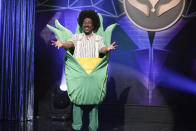 This image released by NBC shows Eddie Murphy as Buckwheat during the "Masked Singer" Sketch on "Saturday Night Live." Murphy won the award for outstanding guest actor in a comedy series during the Creative Arts Emmy Awards on Saturday, Sept. 19, 2020. (Will Heath/NBC via AP) SATURDAY NIGHT LIVE -- "Eddie Murphy" Episode 1777 -- Pictured: Host Eddie Murphy as Buckwheat during the "Masked Singer" Sketch on Saturday, December 21, 2019 -- (Photo by: Will Heath/NBC)