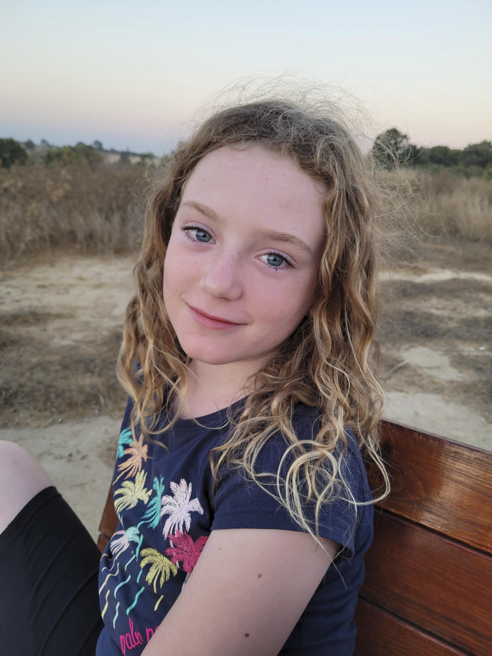 This September 2023 photo shows Emily Hand near Kibbutz Be’eri, Israel. Emily is believed to be among the hostages taken by Hamas militants in their incursion into Israel on Oct. 7, 2023. (Yael Shahrur Noah via AP).