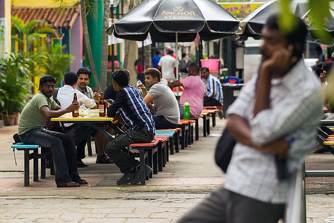 Foreign workers enjoying their break in Little India