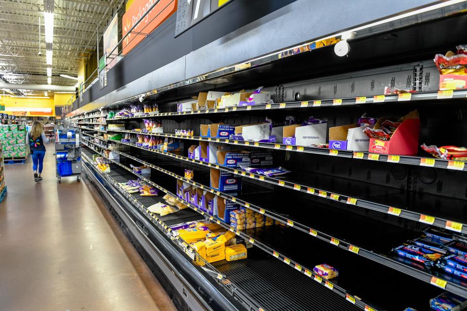 Stores struggle to keep up with demand as shoppers empty shelves March 17 at the Henderson Walmart, stocking up on supplies as the coronavirus pandemic spreads across the nation, forcing restaurants and bars to close.