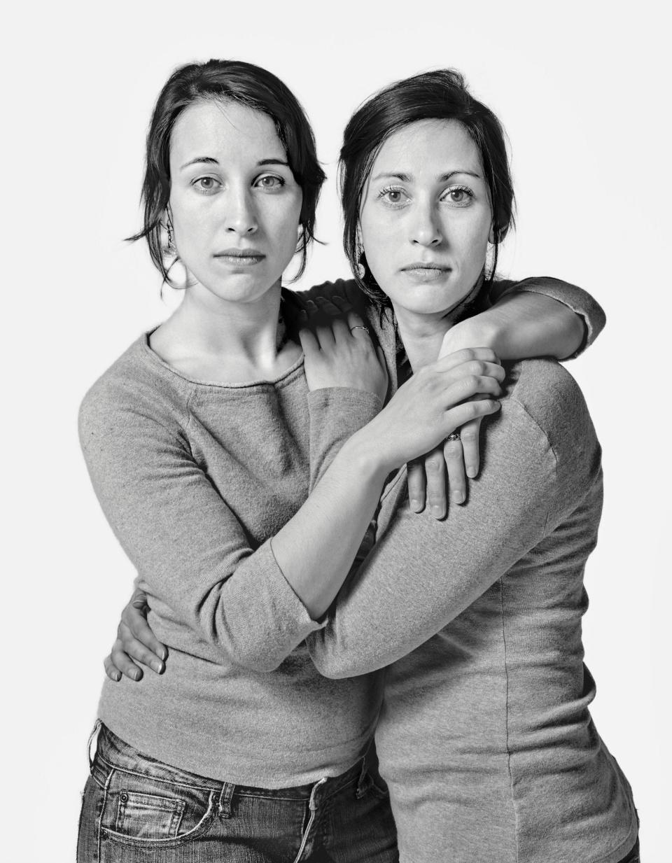 two look alike women with arms wrapped around each other