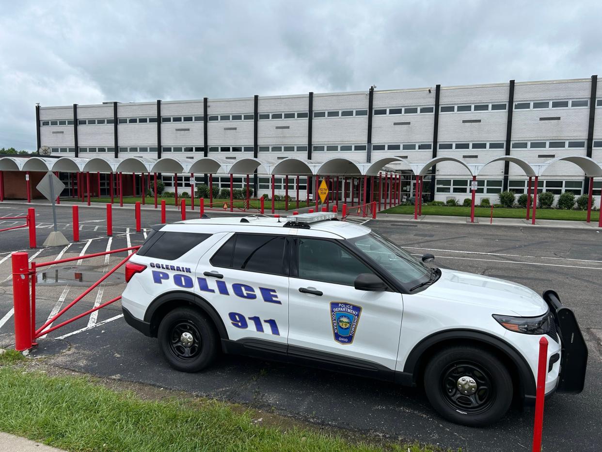 A Colerain police cruiser outside of Colerain High School on Thursday, May 9, 2024. Colerain High School, Northwest High School and White Oak Middle School were all evacuated Thursday morning after they received bomb threats via email.