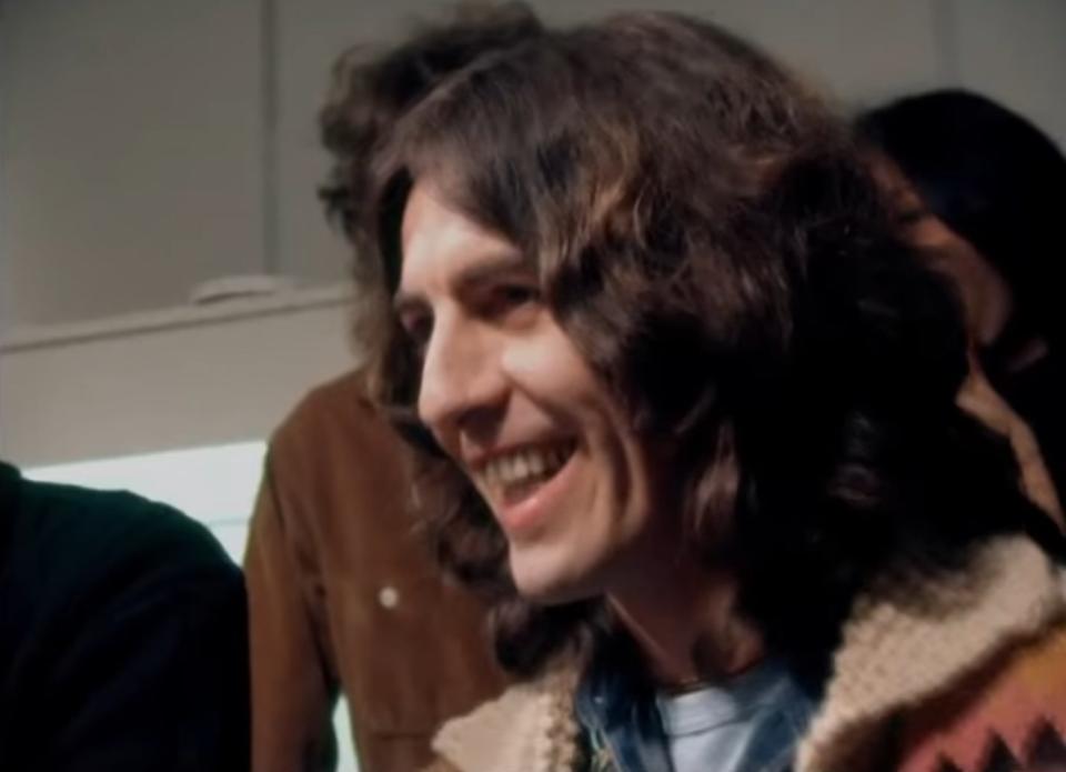 George Harrison smiles