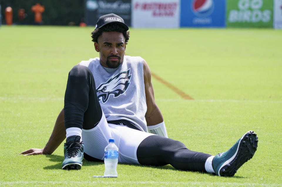 Philadelphia Eagles' Jalen Hurts looks on after practice at the NFL football team's training camp, Wednesday, July 27, 2022, in Philadelphia. (AP Photo/Chris Szagola)