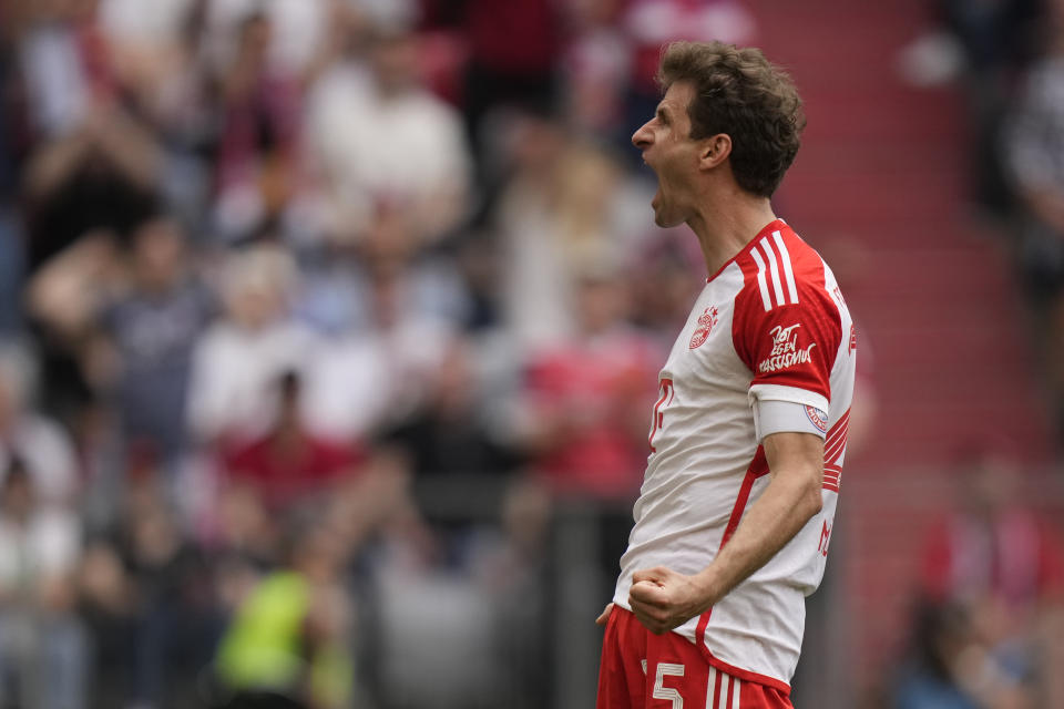 Bayern's Thomas Mueller celebrates after scoring his side's second goal during the German Bundesliga soccer match between Bayern Munich and Cologne at the Allianz Arena in Munich, Germany, Saturday, April 13, 2024. (AP Photo/Matthias Schrader)