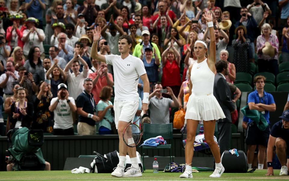 Jamie Murray and Victoria Azarenka wave to the crowd after their latest win - PA