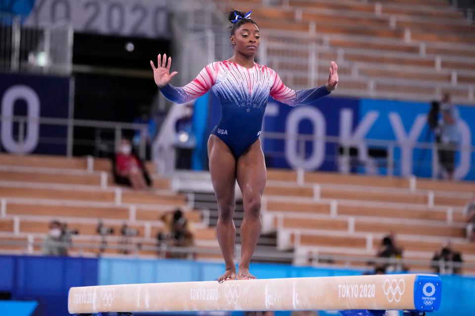 Simone Biles competes on the women's balance beam during the Tokyo 2020 Olympic Summer Games.