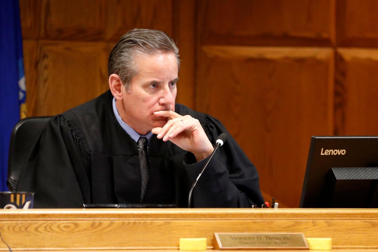 Outagamie County Judge Vincent Biskupic ordered a man convicted of sexual assault to pay $150,000 in restitution to the county, even though the county declined to request it because it feared the issue could retraumatize the victim. He is seen here in his capacity as an Outagamie County Circuit Court judge in 2018 in Appleton, Wis.