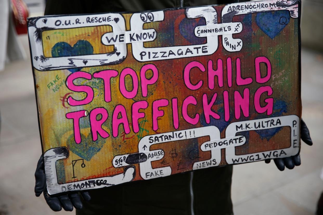 British conspiracy theorists protested outside Downing Street over fictional child trafficking rings earlier this month (Getty Images)