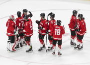 Canada celebrates a win over Finland in an IIHF World Junior Hockey Championship game Thursday, Dec. 31, 2020, in Edmonton, Alberta. (Jason Franson/The Canadian Press via AP)