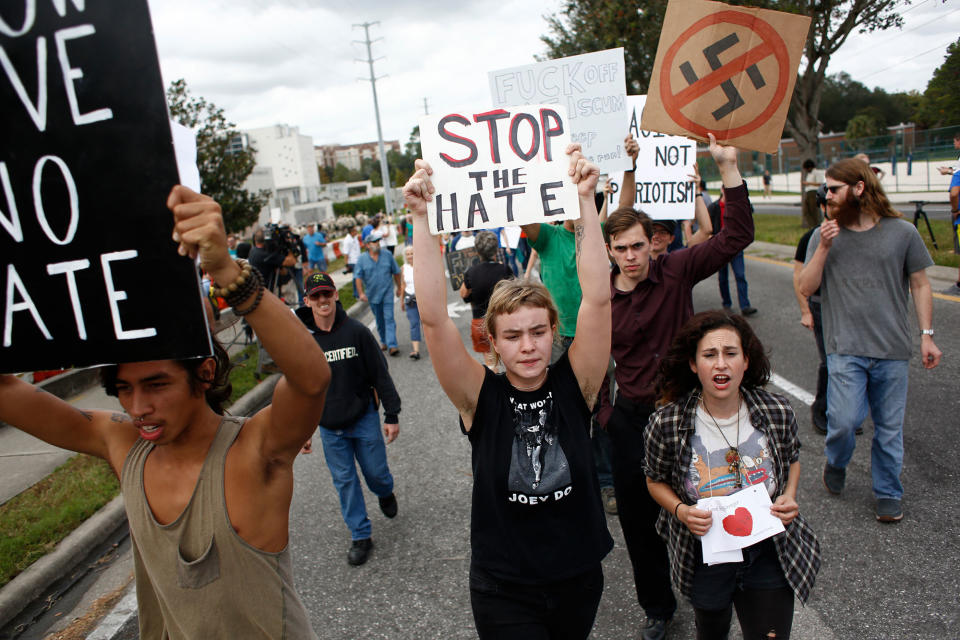 <p>Demonstrators gather at the site of a planned speech by white nationalist Richard Spencer, who popularized the term ‘alt-right’, at the University of Florida campus Oct.19, 2017 in Gainesville, Fla. (Photo: Brian Blanco/Getty Images) </p>