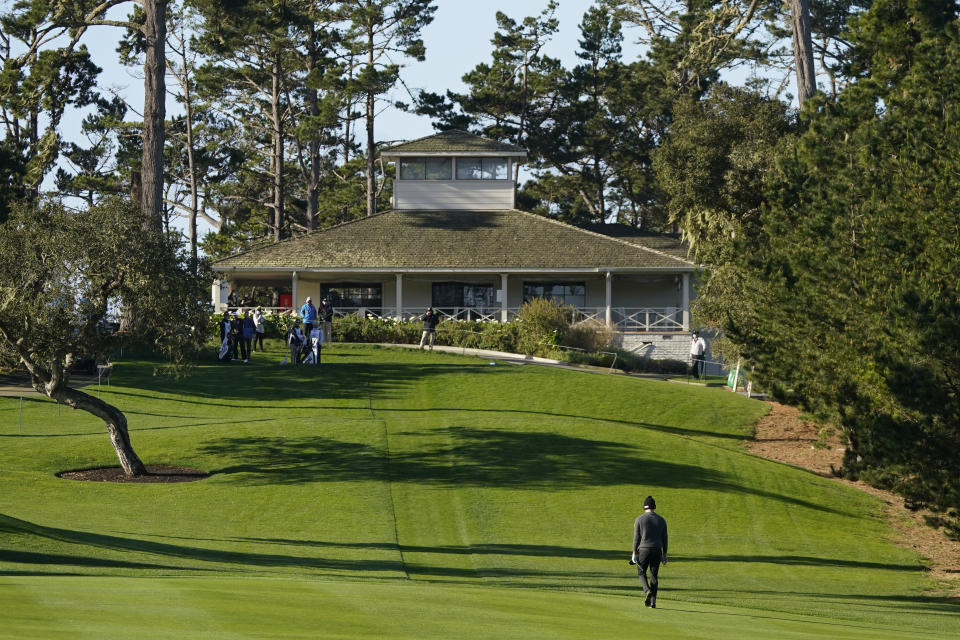 Patrick Cantlay walks back to the 10th tee of the Spyglass Hill Golf Course to hit again after a lost ball during the second round of the AT&T Pebble Beach Pro-Am golf tournament Friday, Feb. 12, 2021, in Pebble Beach, Calif. (AP Photo/Eric Risberg)